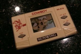 Sunwing Cowboy Vintage Electronic Handheld Lcd Video Game And Watch ✨tested✨