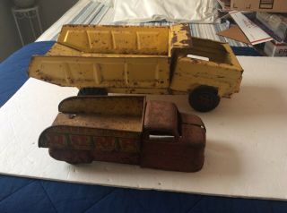 Two Antique Pressed Steel Toy Dump Trucks - Marx Lumar