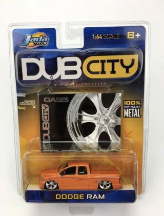 2004 Jada Toys Dub City - 1:64 Slammed Low Rider Orange Dodge Ram W/ Rims Oasis