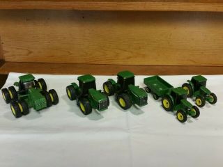 Ertl John Deere Licensed Products Tractors/wagon 1 Die Cast,  4 Plastic 2.  5 - 4 " L