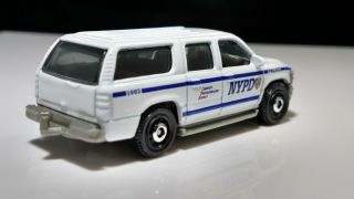 NYPD Matchbox.  DJY03.  Loose,  Fresh form Box White 2000 Chevrolet Suburban NYPD 2