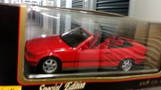 1:18 scale model by Maisto 1993 BMW 325i Convertible in Red. 2