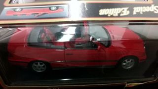 1:18 scale model by Maisto 1993 BMW 325i Convertible in Red. 4