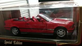 1:18 scale model by Maisto 1993 BMW 325i Convertible in Red. 5