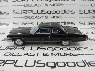Auto World 1:64 Loose Collectible Black 1976 Cadillac Coupe Deville D 