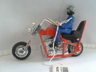 Vintage Turbo Chopper Motorcycle Toy Bearded Man