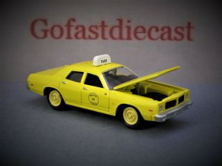 1977 Dodge Monaco Taxi D.  C.  Cab 1/64 Johnny Lightning Collectible Model