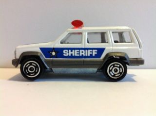 1/64 scale JEEP CHEROKEE XJ Sheriff car package pull Majorette 2