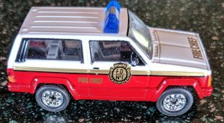 Matchbox Jeep Cherokee Fire Chief With Rubber Tires White Over Red 1/64 Scale