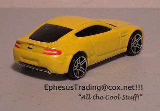 2005 Hot Wheels FE Realistix Aston Martin V8 Vantage Coupe Yellow 11 1/64 2