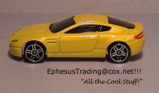 2005 Hot Wheels FE Realistix Aston Martin V8 Vantage Coupe Yellow 11 1/64 3