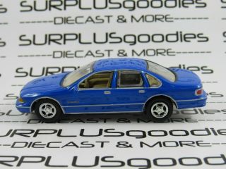 Johnny Lightning 1:64 Loose Collectible Blue 1995 Chevrolet Caprice Diorama Car