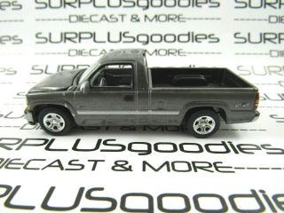 Johnny Lightning 1:64 Loose Gunmetal 2000 Chevrolet Silverado 1500 Pickup Truck