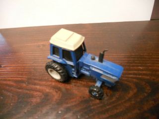 Ertl Farm Country Toy Ford Holland Tw - 35 Mfwd Blue Stripe Tractor 1/64 Scale