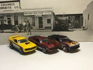 Hot Wheels 1970 Mustang Mach 1 X3.  2016 Multipack Yellow,  2007 Red &2005 Purple