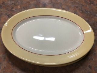 2 Albert Pick Co.  Chicago Restaurant Ware Vitrified China Yellow Oval Plates