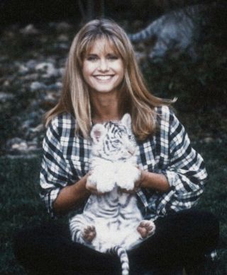 Olivia Newton John - Holding A Baby Tiger ???? With Her Awesome Smile