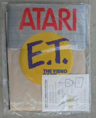 Vintage 80’s Atari E.  T.  Store Mobile Sign & 32 Page How To Win At E.  T.  Game Mag.
