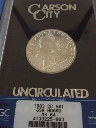 1883 - CC Morgan Silver Dollar in GSA Holder NGC - MS64.  GSA Hoard 2