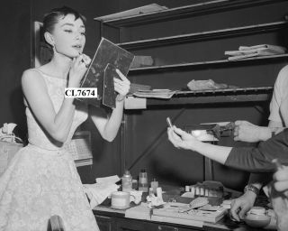 Audrey Hepburn Applying Lipstick In Her Dressing Room Of The Center Theater