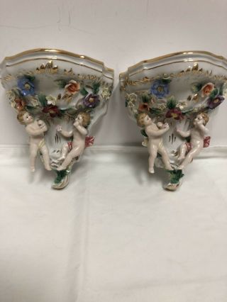 Vintage German Porcelain Wall Bracket Shelf Cherub Porcelain Figurine Pair