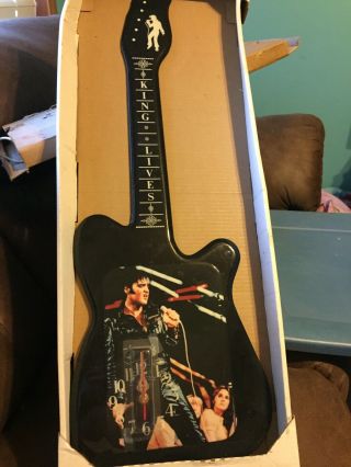 Vintage Elvis Presley Wood Lacquered Wall Hanging Guitar Clock