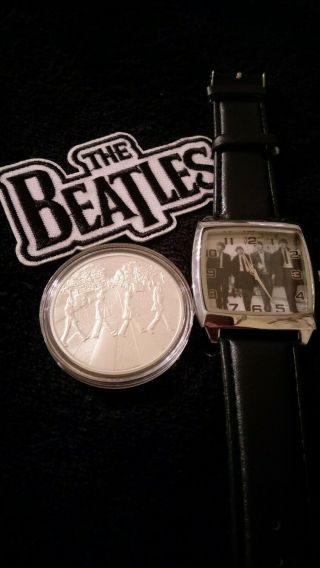 The Beatles Watch,  Patch,  Coin,  Coin Has All The Songs On The Abbey Road Album.