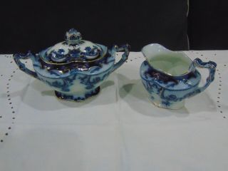 Antique A J Wilkinson Royal Staffordshire Flow Blue Iris Sugar Bowl & Creamer
