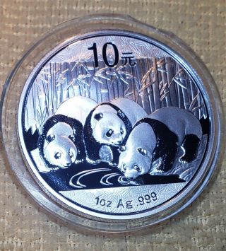 Silver Panda Coin,  2013 1 Oz.  999 Fine Silver 10 Yuan Coin In Capsule.
