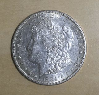 1884 - S Au Morgan Silver Dollar