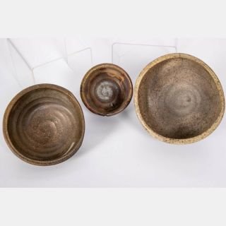 George Roby (American,  1936 - 2017) A Group of Five Bowls,  Raku ceramic, 2
