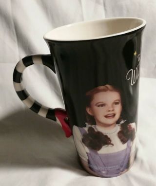 Wizard Of Oz Coffee Mug Cup,  Stripe Handle With Faces Of Dorothy And Witch.