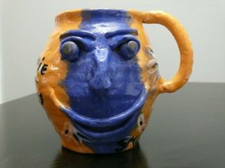 Hippie Face Jug Pottery,  Peace,  Smile Fest Signed By John B,  Orange,  Blue,  Green