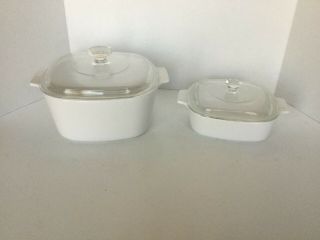 Vintage 2 Corning Ware White 1 - 1liter A - 1 - B 1 - 3 Liter A - 3 - B W/ 2 Lids