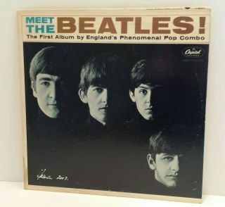 Very 1st Issue Meet The Beatles Album Capitol Signed By Robert Freeman 2003