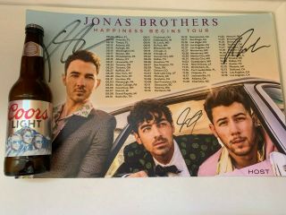 Limited Edition Jonas Brothers Coors Light Bottle And Signed Poster