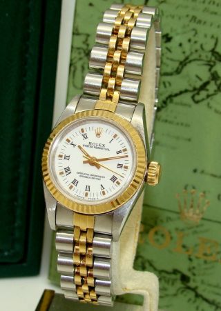 Rolex Womens Stainless & Gold White Roman Oyster Perpetual Watch 67193 C.  1990