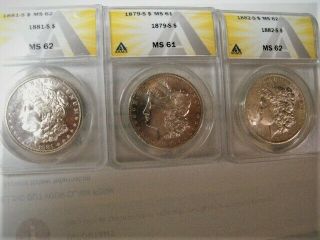 Three Certified Morgan Dollars,  1879 S,  1881s,  1882 S,  Sharp Coins