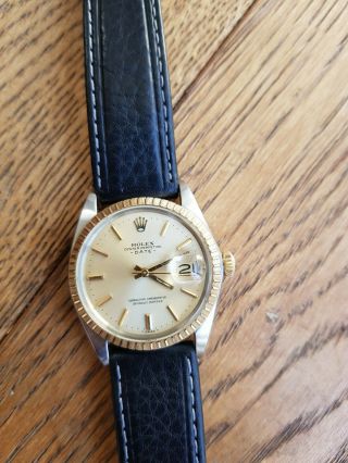 Rolex oyster perpetual date with 18k gold bezel 2