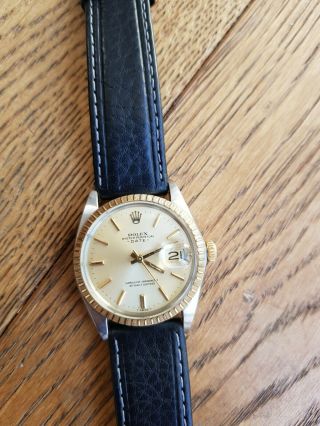 Rolex oyster perpetual date with 18k gold bezel 3