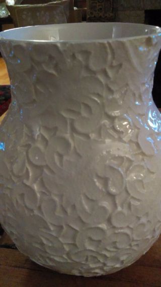 Crate & Barrel White Pottery Vase,  8 " Tall, .  Hand Crafted Lace Pattern