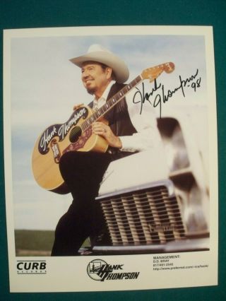 Hank Thompson Autographed 8x10 Color Picture With Certificate Of Authenticity.