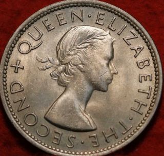Uncirculated 1955 Rhodesia & Nyasaland 1/2 Crown Clad Foreign Coin