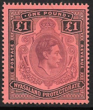 Nyasaland 1938 £1 Purple & Black/red,  Sm Hinged (could Be Um).  Sg 143.  Cat.  £50.