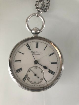 A Silver Pocket Watch J W Benson London On A Silver Chain & With Key