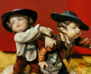 Naples Capodimonte porcelain figure with two boy with hats and flower bag 2