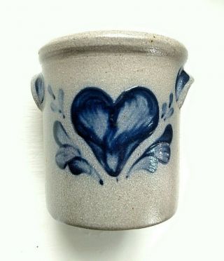 Small stoneware Rowe Pottery two handled Crock with blue heart design.  1995 2