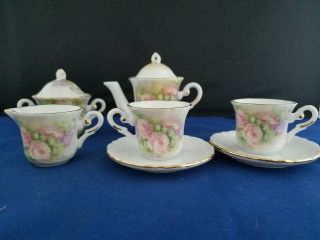 Porcelain Floral Mini Teaset: Teapot,  Sugar Bowl,  Creamer,  Cups And Saucers