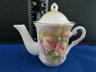 Porcelain Floral Mini Teaset: Teapot,  sugar bowl,  creamer,  cups and saucers 3
