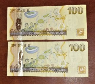 TWO Fiji $100 ONE HUNDRED DOLLARS BANKNOTE 2007 bill circulated,  CREASED M 3